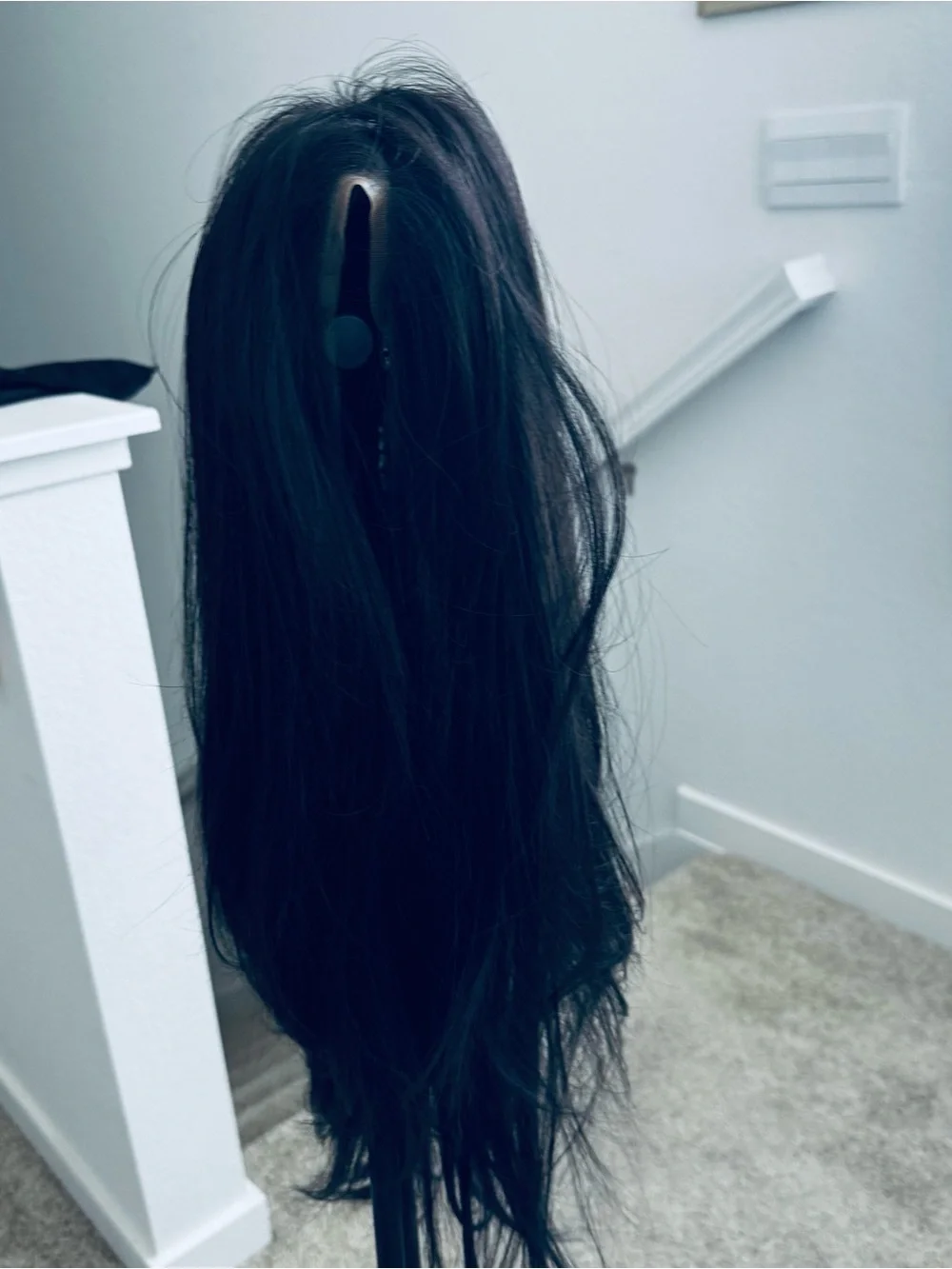 Sleek Black Layered Women's Hairstyle - Brand Unspecified